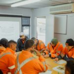 team meeting at Vac U Digga civil construction and hydro excavators in Christchurch New Zealand